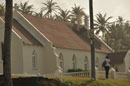 Lady walking past Church