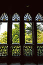 Multiple Arched windows with Shutters