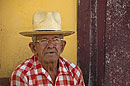Cuban Man Straw Har and checked shirt