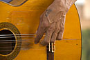 Finger plucking a Spanish Guitar