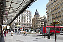 Red Bus Turning in Gran Via Madrid