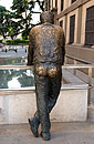 Bronze Statue Man leaning