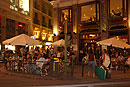 Tourists arriving at Night at Café Principe Madrid