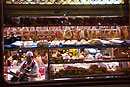 Hanging Hams in Madrid Shop at Night