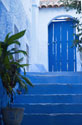 Stairs to blue door