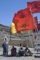 Red Moroccan flags at Imilchil