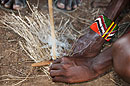 Maasai Tribesman Making Fire
