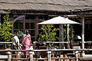 Maasai on Verandah by Mara River