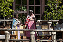 Maasai on Verandah by Mara River