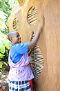 Maasai Women Clay the Main Lodge 