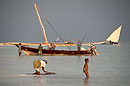 Woman & Child Wash Cloth in Sea