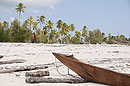 Child by Boat and Palms
