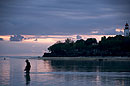 Fisherman Wading at Lighthouse