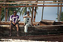 2 Zanzibari Men Sitting Dhow