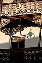 Ornate Wooden Balcony Shadows