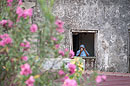 Lady at Window Stone Town  