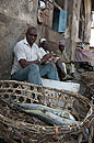 Men sitting outside  Fish Market